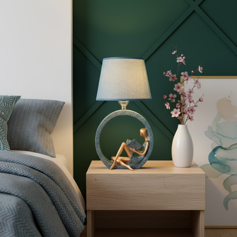 Decorative bedside table lamp with reading figure